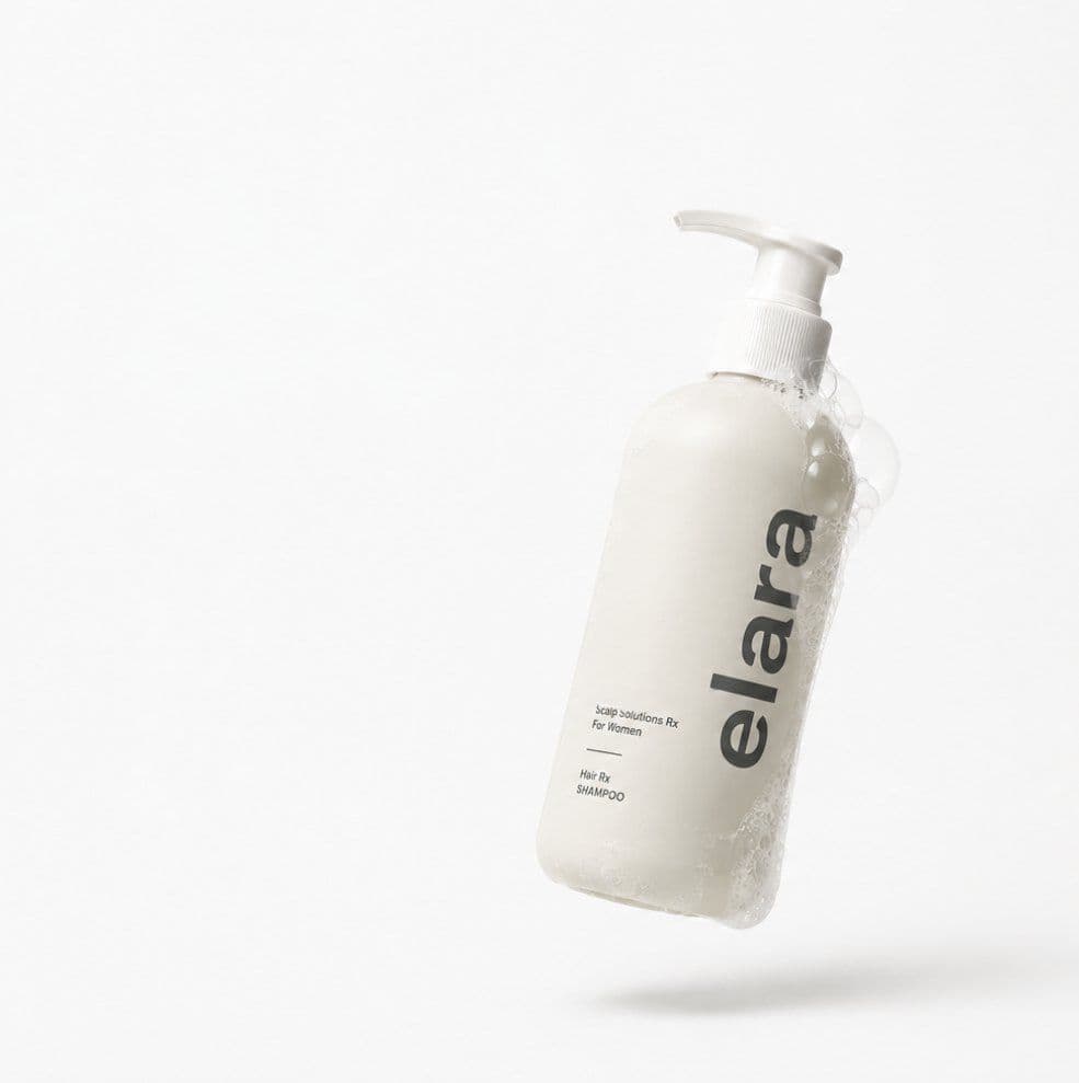 The elara Scalp Solutions Rx shampoo pump bottle